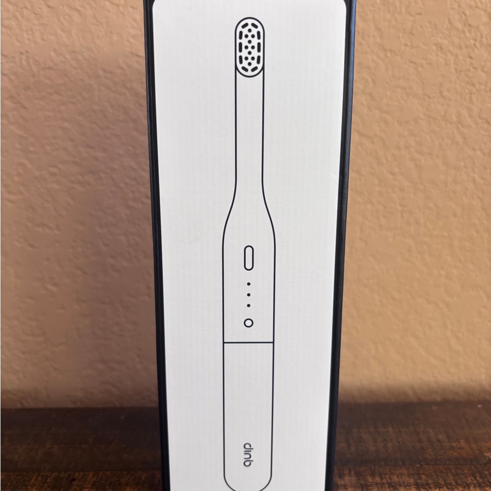 NIP-Quip Toothbrush color air